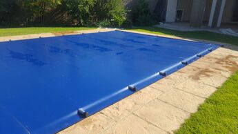 Swimming pool covers